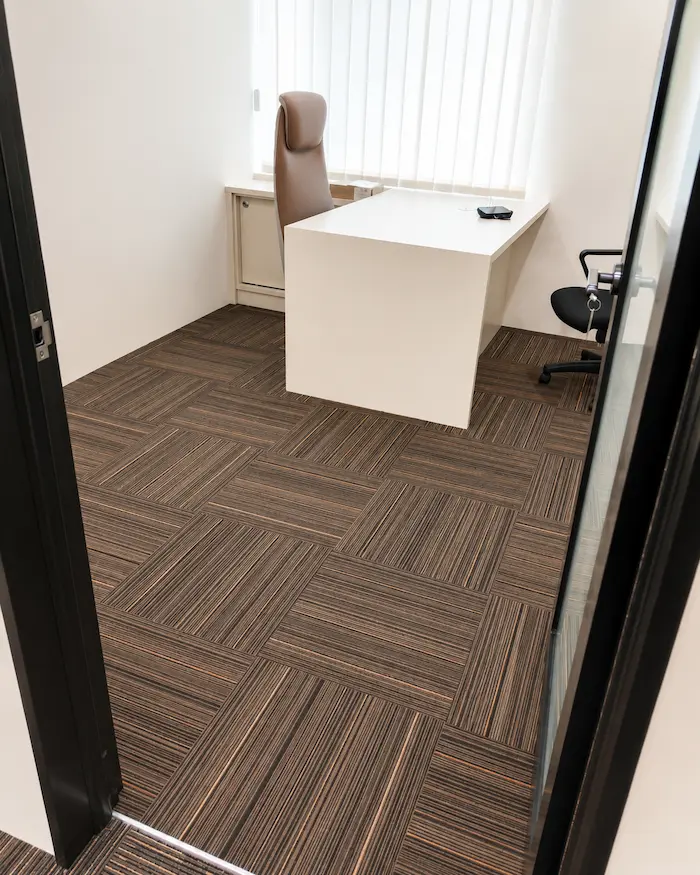 Installed carpet tiles in a private office